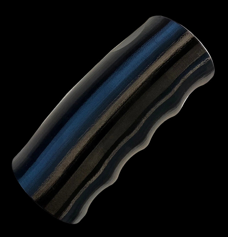 Black and blue striped cylindrical object on a white background